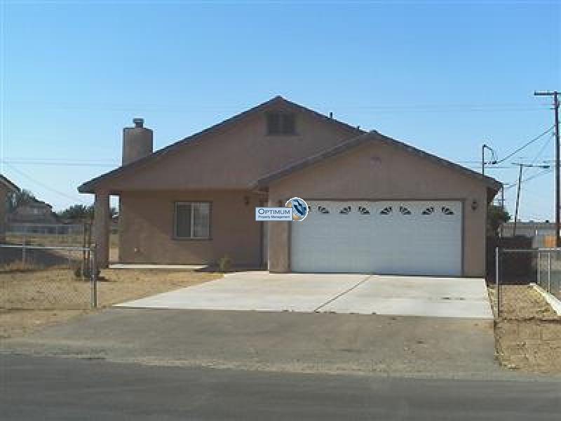 Lots of tile and a fireplace in this Hesperia home 1
