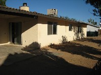 Three bedroom on good lot with covered patio 10